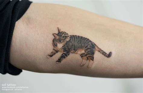 cat lining tattoo|unique cat name tattoos.